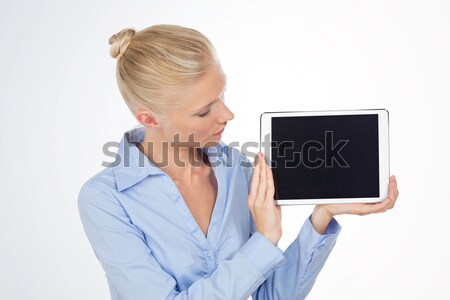 бизнеса женщину глядя таблетка экране Сток-фото © Dave_pot