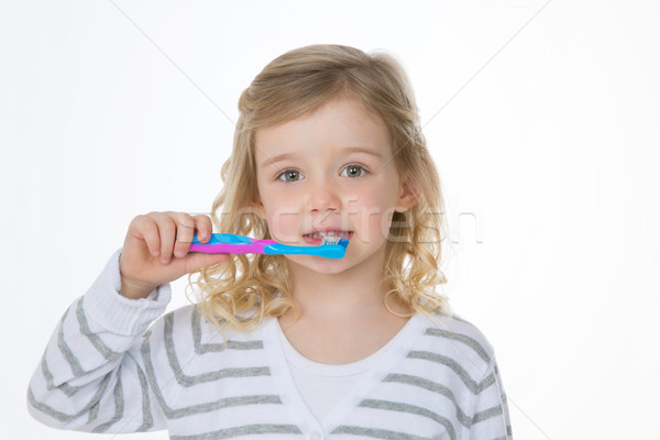 closeup of blonde girl on white background Stock photo © Dave_pot