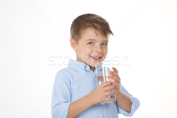 Viclean copil băiat băuturi Imagine de stoc © Dave_pot