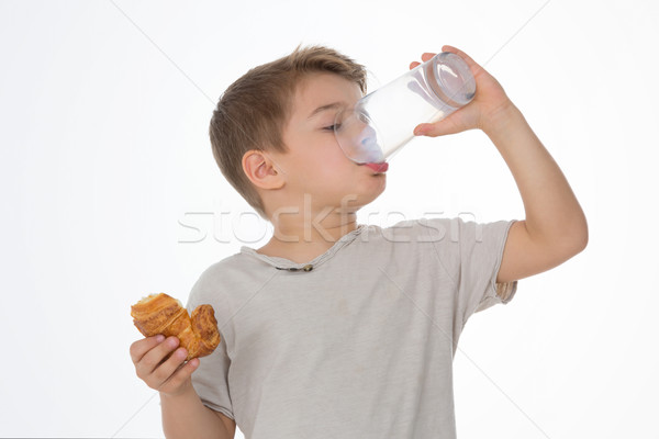 Dziecko śniadanie dziecko szkła mleka rogalik Zdjęcia stock © Dave_pot