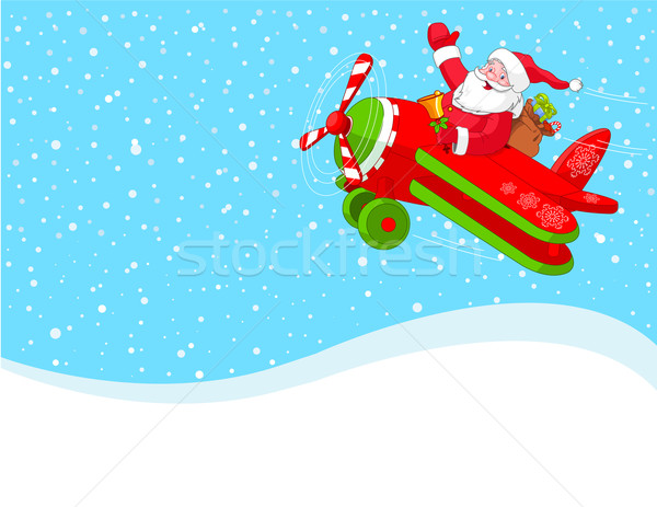 Santa is flying in an airplane background Stock photo © Dazdraperma