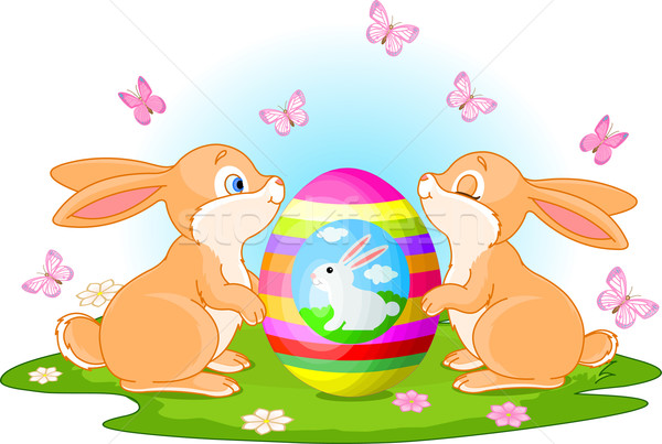 Easter egg twee cute konijnen voorjaar weide Stockfoto © Dazdraperma