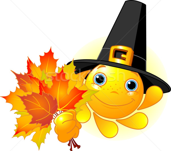 Sun with pilgrim hat holding autumn leaves Stock photo © Dazdraperma