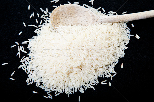 Bianco riso bianco nero legno cucchiaio Foto d'archivio © dbvirago