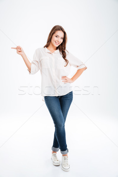Stok fotoğraf: Tam · uzunlukta · portre · mutlu · kadın · işaret · parmak