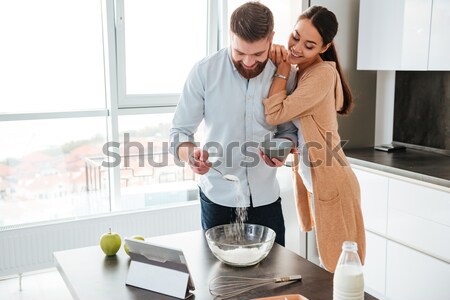 Couple cuit cuisine joli table fille Photo stock © deandrobot