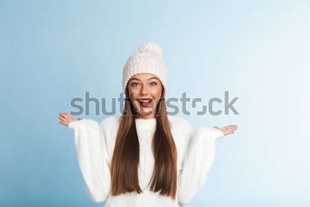 Smiling Woman in beachwear talking on phone Stock photo © deandrobot