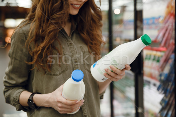 Imagen mujer leche verde camisa Foto stock © deandrobot