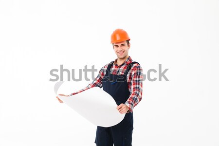 Stock photo: Full length portrait of a smiling young male builder