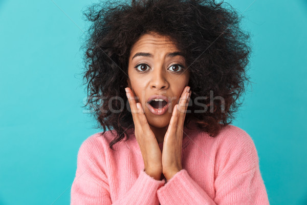 Colorful image closeup of surprised woman grabbing face with exc Stock photo © deandrobot