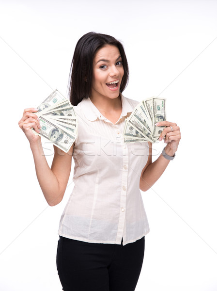 Laughing businesswoman holding US dollar bills Stock photo © deandrobot