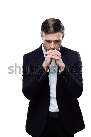 Portrait of a pensive businessman isolated on a white background Stock photo © deandrobot