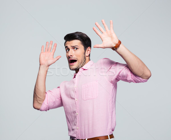 Scared and screaming businessman stop gesturing Stock photo © deandrobot