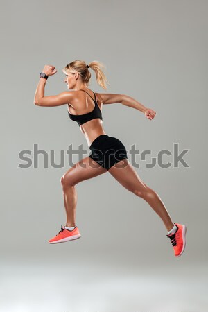 Acróbata mujer gimnasta traje posando aislado Foto stock © deandrobot