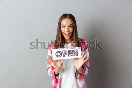 Derűs lány mutat laptop számítógép képernyő portré Stock fotó © deandrobot
