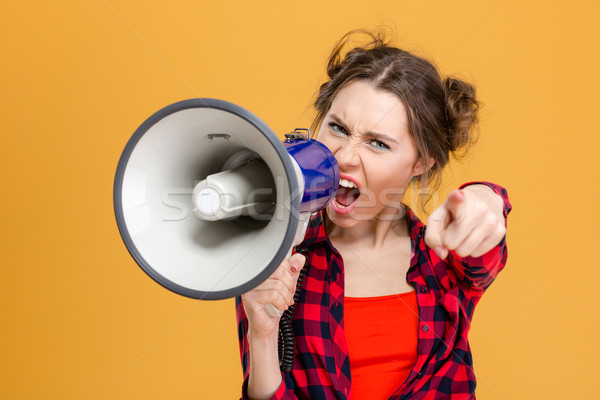 Bosszús dühös nő kiált hangfal mutat Stock fotó © deandrobot