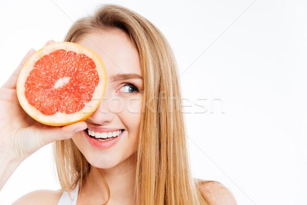 Femeie felie grapefruit fericit izolat Imagine de stoc © deandrobot