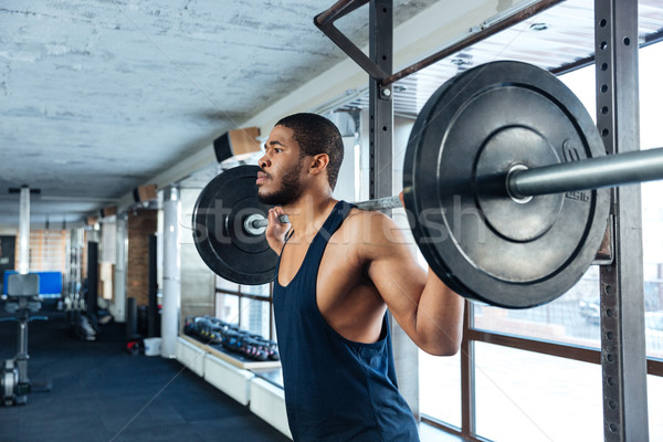 Muscular fitness homem pesado exercer ginásio Foto stock © deandrobot