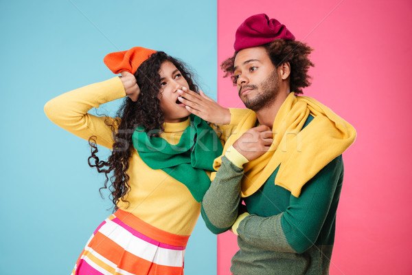 Upset exhausted african american young couple standing and yawning Stock photo © deandrobot