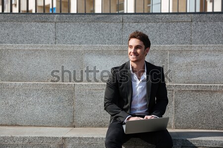 [[stock_photo]]: Coureur · sac · parler · téléphone · escaliers · gris