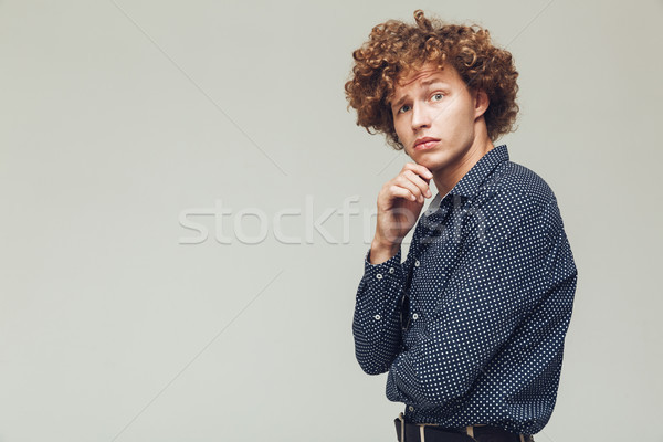 Komoly retro férfi pózol izolált néz Stock fotó © deandrobot