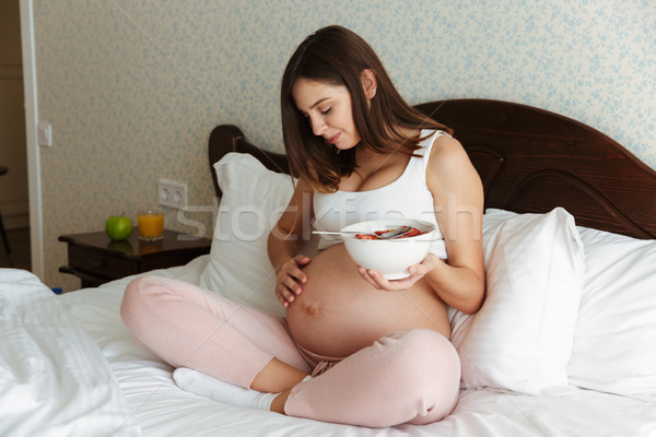 Stock photo: Portrait of an attractive young pregnant woman