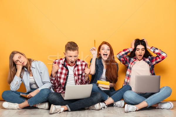 Groupe excité école amis devoirs séance [[stock_photo]] © deandrobot