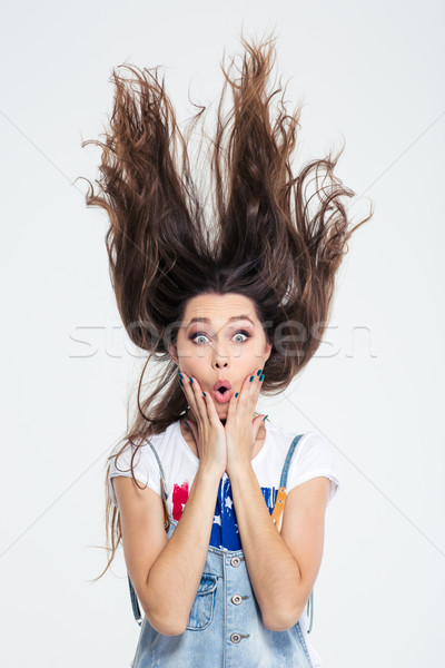 Piękna kobieta włosy w górę powietrza portret odizolowany Zdjęcia stock © deandrobot