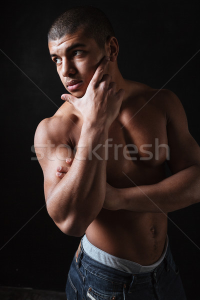 Stock photo: Handsome young african sportsman posing