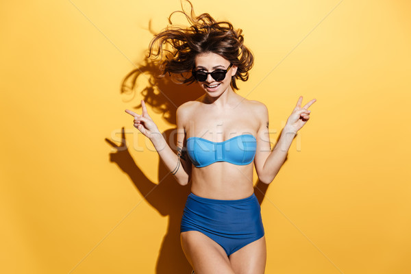 Glücklich jungen Dame Badebekleidung Frieden Stock foto © deandrobot