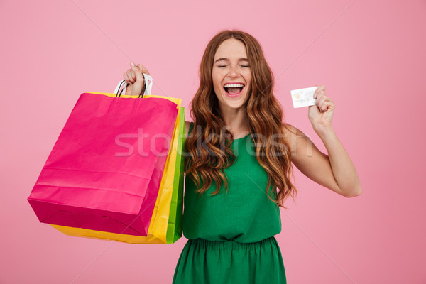 Portrait of a happy satisfied woman Stock photo © deandrobot