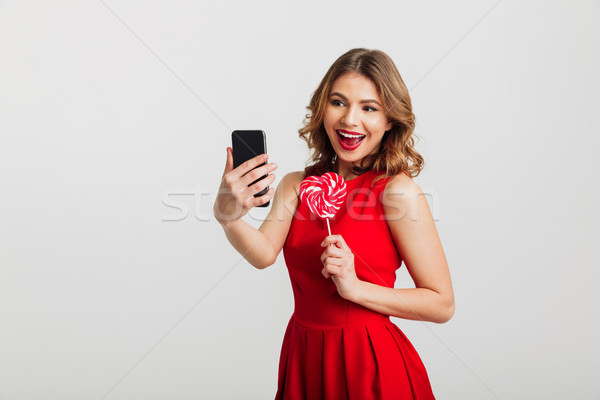 Retrato alegre vestido rojo corazón Foto stock © deandrobot