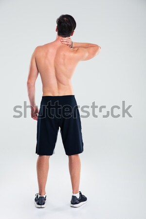 男子 常設 頸部疼痛 後視圖 肖像 孤立 商業照片 © deandrobot