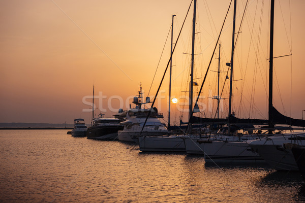 Foto Pier Boote Sonnenuntergang Natur Landschaft Stock foto © deandrobot
