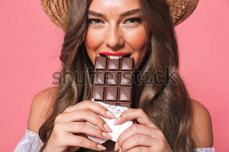 Funny modelo comer chocolate crema ropa interior Foto stock © deandrobot
