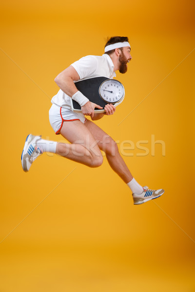尖叫 年輕 運動員 跳躍 秤 商業照片 © deandrobot