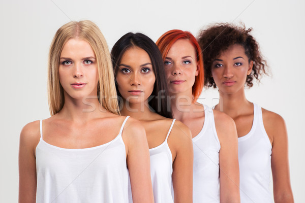Portré négy komoly többnemzetiségű nők áll Stock fotó © deandrobot