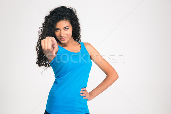 Gelukkig afro amerikaanse vrouw wijzend vinger Stockfoto © deandrobot