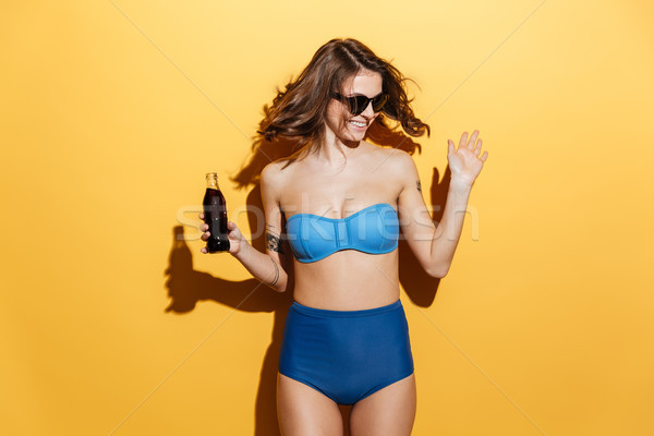 Lächelnd Badebekleidung halten Wasser Bild Stock foto © deandrobot