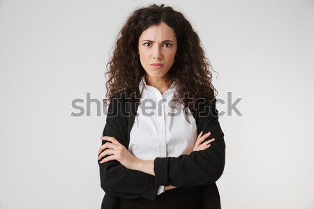 Portret ontdaan jonge zakenvrouw permanente armen Stockfoto © deandrobot