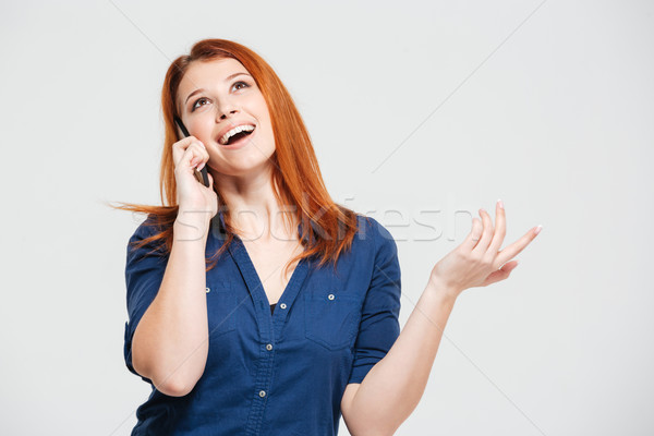Glücklich schönen Rotschopf sprechen Handy Stock foto © deandrobot