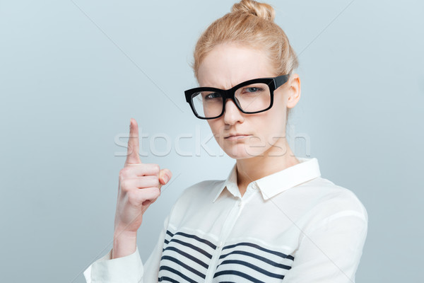 Woman wagging her finger Stock photo © deandrobot