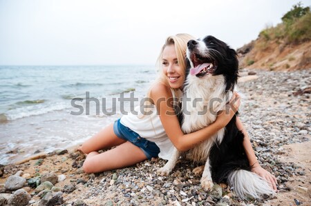 Mutlu kadın sevimli köpek plaj güzel Stok fotoğraf © deandrobot