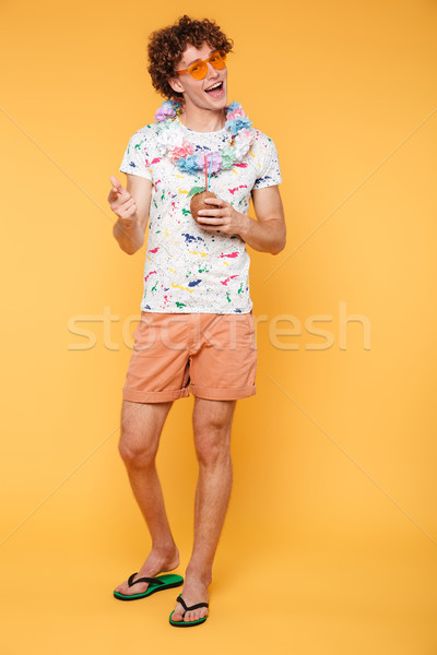 Stock photo: Full length portrait of a happy man in summer clothes