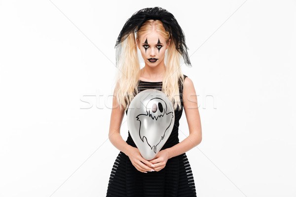 Scary blonde woman dressed in black widow costumebackground Stock photo © deandrobot