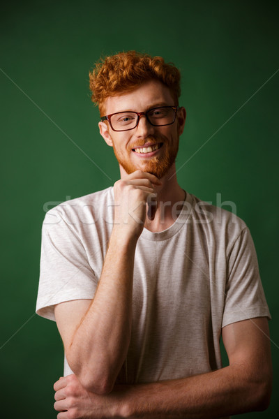 Porträt lächelnd Rotschopf Mann halten Stock foto © deandrobot