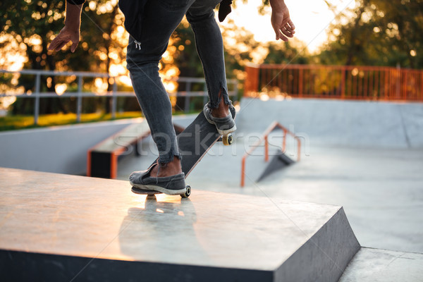 Close up of a young skateboarder Stock photo © deandrobot