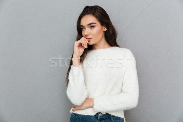 Close-up portrait of charming thoughtful brunette woman looking  Stock photo © deandrobot