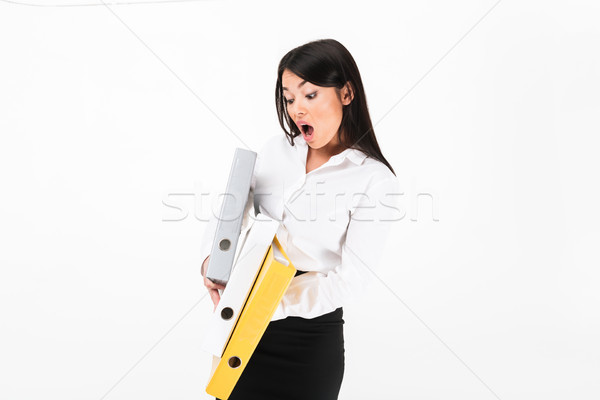 Portrait of a surprised asian businesswoman Stock photo © deandrobot