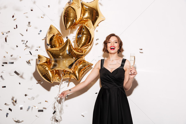 Stockfoto: Portret · gelukkig · meisje · zwarte · jurk · lucht · ballonnen